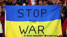24.03.2022
A Polish football fan shows his support to Ukraine during the International Friendly soccer match between Scotland and Poland at Hampden Park stadium in Glasgow, Scotland, Thursday, March. 24, 2022. (AP Photo/Scott Heppell)