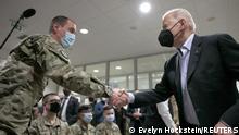 U.S. President Joe Biden meets with U.S. Army soldiers assigned to the 82nd Airborne Division at the G2 Arena in Jasionka, near Rzeszow, Poland, March 25, 2022. REUTERS/Evelyn Hockstein
