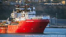 FILE - The Ocean Viking rescue ship is moored at Porto Empedocle harbor, southern Italy, on July 6, 2020. A charity operating a rescue ship with 306 migrants aboard says after days of waiting at sea Italy has assigned it a port of safety. SOS Mediterranee tweeted on Wednesday, Nov. 10, 2021 evening that those aboard Ocean Viking were feeling indescribable relief that Italian authorities granted permission of the migrants to be disembarked in Augusta, Sicily. (Fabio Peonia/LaPresse via AP)