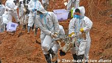 FILE - In this photo released by Xinhua News Agency, rescuers carry a piece of plane wreckage at the site of Monday's plane crash in Tengxian County, southern China's Guangxi Zhuang Autonomous Region, on March 25, 2022. The second “black box” has been recovered following the crash of a China Eastern Boeing 737-800 that killed 132 people last week, Chinese state media said Sunday, March 27. (Zhou Hua/Xinhua via AP, File)
