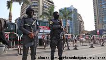 (161112) -- CAIRO , Nov. 12, 2016 () -- Egyptian security forces stand guard at a square in Giza, Egypt on Nov.11, 2016. As Egypt moves forward on the path to securing a 12 billion U.S. dollars loan package from the International Monetary Fund (IMF), the country has found itself facing mysterious calls on social media for protests on Friday against economic conditions, according to official Ahram Online. (/Ahmed Gomaa)