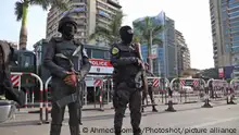 (161112) -- CAIRO , Nov. 12, 2016 () -- Egyptian security forces stand guard at a square in Giza, Egypt on Nov.11, 2016. As Egypt moves forward on the path to securing a 12 billion U.S. dollars loan package from the International Monetary Fund (IMF), the country has found itself facing mysterious calls on social media for protests on Friday against economic conditions, according to official Ahram Online. (/Ahmed Gomaa)