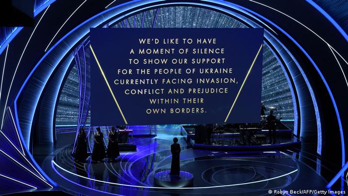 A message in support of Ukraine is displayed on a screen onstage during the 94th Oscars at the Dolby Theatre in Hollywood