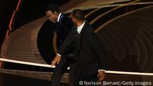 HOLLYWOOD, CALIFORNIA - MARCH 27: (L-R) Chris Rock and Will Smith are seen onstage during the 94th Annual Academy Awards at Dolby Theatre on March 27, 2022 in Hollywood, California. (Photo by Neilson Barnard/Getty Images)