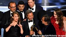 Coda cast and crew accept the award for Best Picture for CODA onstage during the 94th Oscars at the Dolby Theatre in Hollywood, California on March 27, 2022. (Photo by Robyn Beck / AFP) (Photo by ROBYN BECK/AFP via Getty Images)