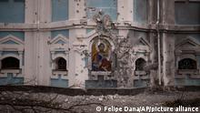 A church is damaged after a Russian attack in Kharkiv, Ukraine, Sunday, March 27, 2022. (AP Photo/Felipe Dana)