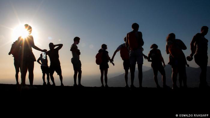 Tourists atop Cerro Negro admire the view 