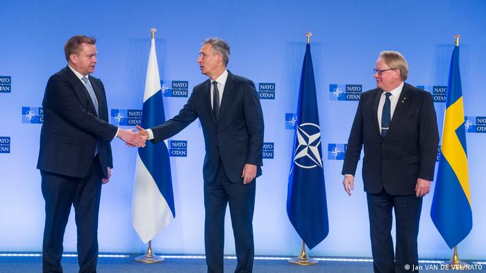 Finnish Defense Minister Antti Kaikkonen, NATO Secretary General Jens Stoltenberg and Swedish Defense Minister Peter Hultqvist appear at NATO HQ