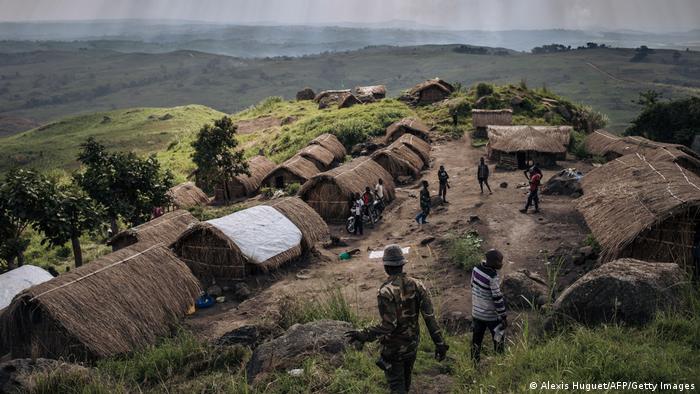 Militias in a village in Ituri province, DRC