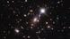 A través del telescopio Hubble se ve solo como un puntito de tres píxeles, pero es, en realidad, la estrella más lejana y antigua nunca observada. A través del telescopio Hubble se ve solo como un puntito de tres píxeles, pero es, en realidad, la estrella más lejana y antigua nunca observada.