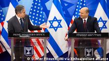 (220328) -- JERUSALEM, March 28, 2022 (Xinhua) -- Israeli Prime Minister Naftali Bennett (R) and visiting U.S. Secretary of State Antony Blinken attend a joint press conference in Jerusalem, March 27, 2022. Blinken is scheduled to attend a conference in southern Israel with his counterparts from Bahrain, Morocco, the United Arab Emirates, and Egypt. (Olivier Fitoussi/JINI via Xinhua)