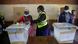 A woman casts her ballot at a polling station in Harare, Zimbabwe. A woman casts her ballot at a polling station in Harare, Zimbabwe.