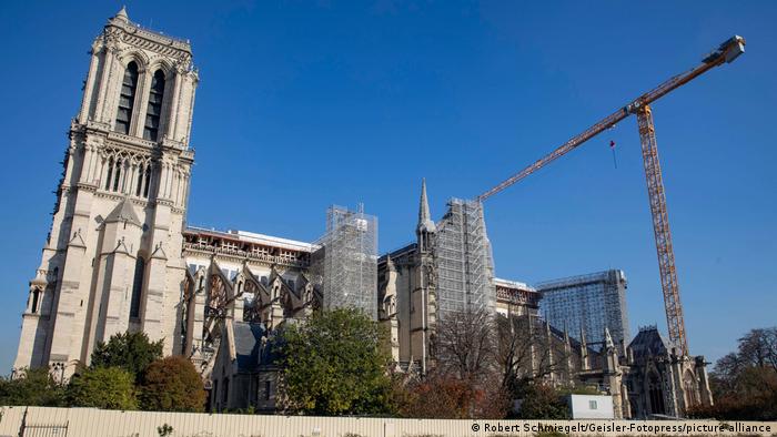 Notre Dame Cathedral with a building crane