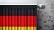 Almanya bayrağının renkerline boyanmış kalorifer ve ardındaki duvarda euro sembolleri