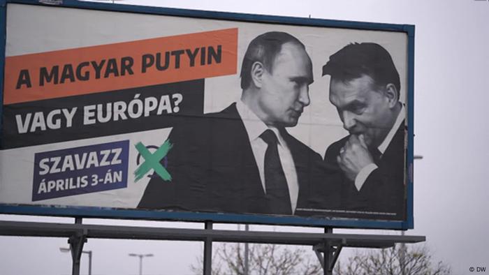 Billboard showing Putin and Orban