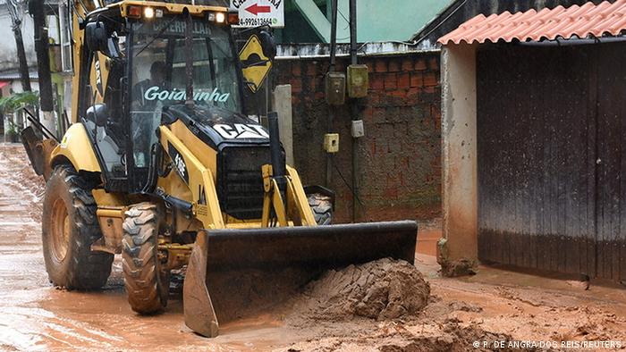 Machinery removes dedbris and earth following heavy rainfall, in Angra dos Reis, Brazil, April 2, 2022