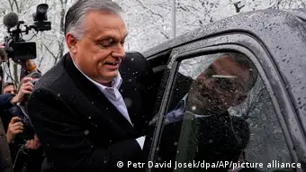 Viktor Orban gets into a car