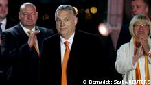 Hungarian Prime Minister Viktor Orban arrives to address supporters after the announcement of the partial results of parliamentary election in Budapest, Hungary, April 3, 2022. REUTERS/Bernadett Szabo