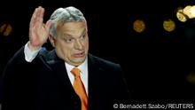 Hungarian Prime Minister Viktor Orban arrives to address supporters after the announcement of the partial results of parliamentary election in Budapest, Hungary, April 3, 2022. REUTERS/Bernadett Szabo