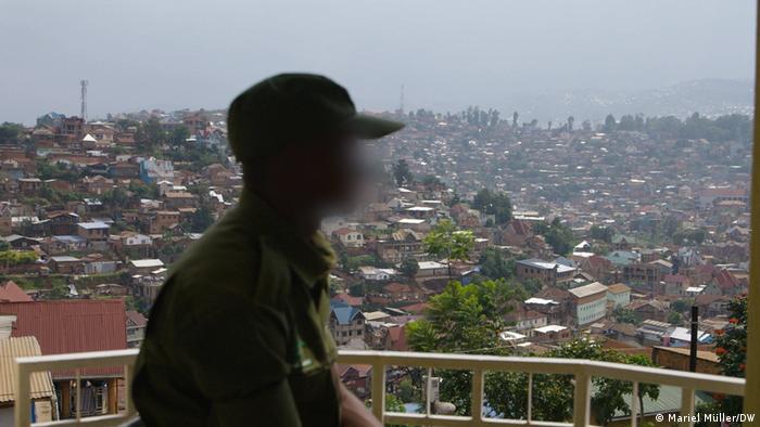 A blurred image of a park ranger DRC