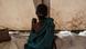 A Dinka boy, suffering from cholera and severe malnutrition sits on the floor of a tent converted into a temporary field hospital near the remote village of Dor, Awerial country, in central South Sudan A Dinka boy, suffering from cholera and severe malnutrition sits on the floor of a tent converted into a temporary field hospital near the remote village of Dor, Awerial country, in central South Sudan