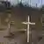 Αυτοσχέδιοι τάφοι με εκτελεσμένους στην Μπούτσα