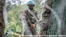 28.01.2022
MONUSCO blue helmet deployed near Kibumba, north of Goma, Democratic Republic of Congo, Saturday Jan. 28, 2022. Thousands of people in the Democratic Republic of Congo have been displaced after they fled ongoing clashes between the Congolese army and M23 fighters this week. (AP Photo/Moses Sawasawa)