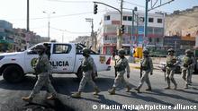 Special Forces Police arrive to a checkpoint in the Manchay district, on the outskirts of Lima, Peru, Tuesday, April 5, 2022. Peruâ€™s President Pedro Castillo imposed a tight curfew on the capital and the countryâ€™s main port in response to sometimes violent protects over rising prices of fuel and food, requiring people in Lima and Callao to mostly stay in their homes all of Tuesday. (AP Photo/Martin Mejia)