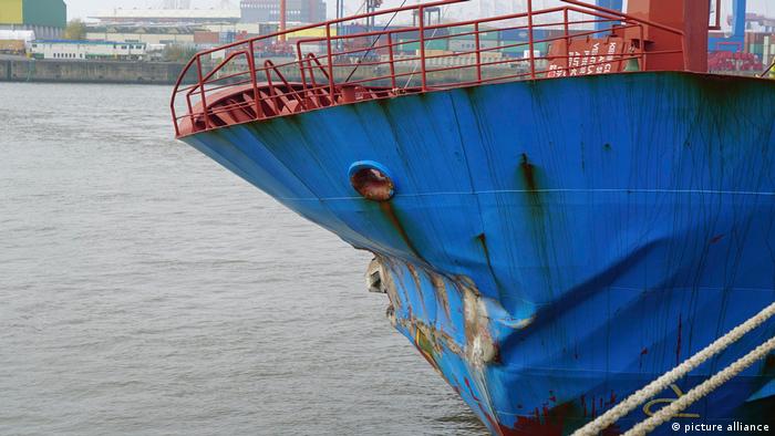 A tanker with a dented bow after colliding with another ship in Hamburg harbor