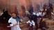 Police officers try to stop activists from throwing red paint at the Spanish parliament Police officers try to stop activists from throwing red paint at the Spanish parliament