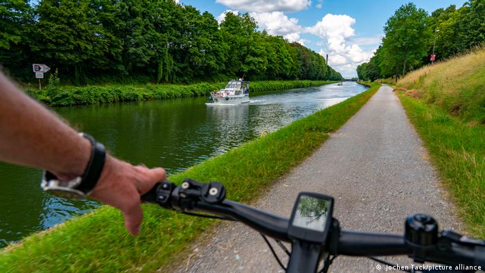 Handlebar as someone rides along the Rhein-Herne Canal.