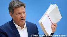 German Economy and Climate Minister Robert Habeck presents the government's so-called 'Easter Package' during a press conference in Berlin, Germany, Wednesday, April 6, 2022. (AP Photo/Michael Sohn)