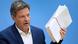 Robert Habeck holds the so-called 'Easter Package' for renewable energy in his hand at a press conference in Berlin Robert Habeck holds the so-called 'Easter Package' for renewable energy in his hand at a press conference in Berlin