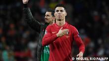 Portugal's forward Cristiano Ronaldo gestures at the end of the World Cup 2022 qualifying final first leg football match between Portugal and North Macedonia at the Dragao stadium in Porto on March 29, 2022. - (Photo by MIGUEL RIOPA / AFP)
