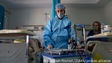 March 12, 2020, Tehran, Iran: Medics and nurses wearing masks and hazmat suits treat patients infected with the new coronavirus COVID-19, at Sina hospital in southern Tehran, Iran. According to the last report by the Ministry of Health, 10,075 people were diagnosed with the Covid-19 coronavirus and 429 people have died in Iran. The outbreak has infected a host of senior officials, politicians, clerics and members of the Revolutionary Guards in Iran, the fourth worst-affected nation after China, South Korea, and Italy. At least seven officials and politicians have died since Feb. 19, when Iran announced first infections and two deaths from the virus. IranÃs clerical rulers have been struggling to contain the spread of the virus, despite the closure of schools and universities and the suspension of religious, cultural and sports events across the country. Iranian officials have repeatedly urged people to avoid unnecessary trips and stay at home. (Credit Image: © Rouzbeh Fouladi/ZUMA Wire