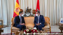 Spanish Prime Minister Pedro Sanchez is welcomed by Morocco's Prime Minister Aziz Akhannouch as he arrives in Rabat on an official visit, in Morocco, Thursday, April 7, 2022. Sanchez has arrived in Rabat to meet with Moroccan King Mohammed VI on a two-day visit that promises to mark an easing of diplomatic tensions centered on Morocco's disputed region of Western Sahara. Relations were damaged last April when Morocco was angered by Spain allowing the leader of the pro-independence movement for Western Sahara to receive medical treatment. (AP Photo/Mosa'ab Elshamy)