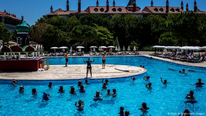 Russian tourists in a swimming pool