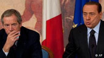 Italian Premier Silvio Berlusconi, right, and Civil Protection chief Guido Bertolaso