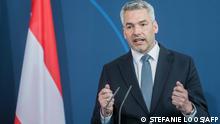 (FILES) In this file photo taken on March 31, 2022 Austrian Chancellor Karl Nehammer addresses a joint press conference with the German Chancellor following bilateral talks at the Chancellery in Berlin. (Photo by Stefanie LOOS / POOL / AFP)