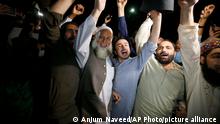 Supporters of an opposition party chant slogans as they celebrate the success of a no-confidence vote against Prime Minister Imran Khan outside the National Assembly, in Islamabad, Pakistan, Sunday, April 10, 2022. Pakistan's political opposition ousted the country's embattled prime minister in a no confidence vote on Saturday, which they won after several of Imran Khan's allies and a key coalition party deserted him. (AP Photo/Anjum Naveed)