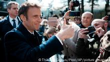 French President and centrist presidential candidate for reelection Emmanuel Macron thumbs up after voting for the first round of the presidential election, Sunday, April 10, 2022 in Le Touquet, northern France. Polls opened across France for the first round of the country's presidential election, where up to 48 million eligible voters will be choosing between 12 candidates. President Emmanuel Macron is seeking a second five-year term, with a strong challenge from the far right. (AP Photo/Thibault Camus, Pool)