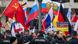 Pro-Russia protesters wave flags during a march in Frankfurt Pro-Russia protesters wave flags during a march in Frankfurt