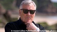Undated handout photo issued by HarperCollins Publishers of best-selling novelist Henry Patterson, who wrote 85 books, including The Eagle Has Landed, using the pseudonym Jack Higgins, has died aged 92. (HarperCollins Publisher/PA via AP)