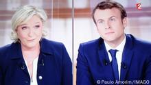  Shows television screen French presidential election candidate for the En-Marche movement Emmanuel Macron and Marine Le Pen, National Front Party during on the eve of a face-to-face TV debate where French presidential candidates will debate as part of their campaign for the second round on May 3, 2017 in Paris,France. Imago/Paulo Amorim