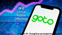 March 15, 2022, Asuncion, Paraguay: Illustration: Logo of GoTo is displayed on a smartphone backdropped by abstract presentation of line chart, the term IPO (Initial Public Offering) and numbers. PT GoTo Gojek Tokopedia Tbk (GoTo Group), the largest digital ecosystem in Indonesia, today announced its plan to carry out an initial public offering (IPO) on the Indonesia Stock Exchange (IDX). GoTo Group ecosystem combines on-demand, e-commerce, and financial services through the Gojek, Tokopedia, GoTo Financial platforms. (Credit Image: Â© Andre M. Chang/ZUMA Press Wire
