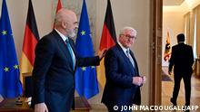 Albanian Prime Minister Edi Rama and German President Frank-Walter Steinmeier (R) proceed to talks at the Bellevue Palace in Berlin, on April 11, 2022. (Photo by John MACDOUGALL / AFP)