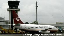 A plane belonging to Chanchangi Airline is parked at the airport in Port Harcourt, Nigeria, Tuesday, Dec. 13, 2005. President Olusegun Obasanjo grounded two private Nigerian airlines Tuesday after two deadly plane crashes killed 224 people in seven weeks. One of the carriers grounded, Sosoliso Airlines, operated the 32-year-old McDonnell Douglas DC-9 that crashed Saturday in the southern city of Port Harcourt, killing 107 people, most of them schoolchildren heading home for the holidays. The second carrier, Chanchangi Airlines, operated a plane that skidded off the runway in the main city of Lagos earlier this year.(AP Photo/George Osodi)