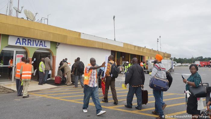 Passengers outside Roberts International Airport Monrovia, Liberia 