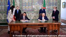 ALGIERS, ALGERIA - APRIL 11: (----EDITORIAL USE ONLY Äì MANDATORY CREDIT - ALGERIAN PRESIDENCY / HANDOUT - NO MARKETING NO ADVERTISING CAMPAIGNS - DISTRIBUTED AS A SERVICE TO CLIENTS----) Italian Foreign Minister Luigi Di Maio (front L2) and Algerian Foreign Minister Ramtan Lamamra (front R2) attend a signing of a gas supply deal between two countries, with the participation of Algerian President Abdelmadjid Tebboune and Italian Prime Minister Mario Draghi, in Algiers, Algeria on 11 April, 2022. Presidency of Algeria/Handout / Anadolu Agency
