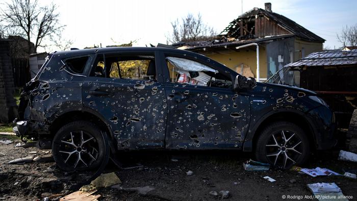 A car in Bucha, riddled with bullet holes